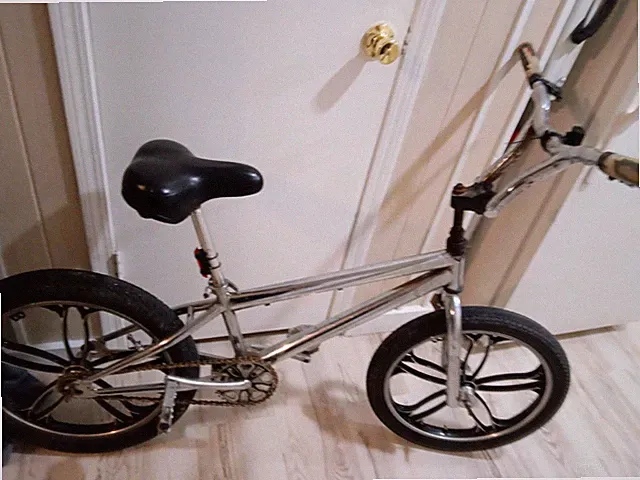 Silver rebuilt Mongoose Street bike